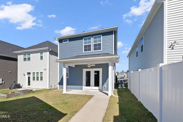 a view of a backyard of the house