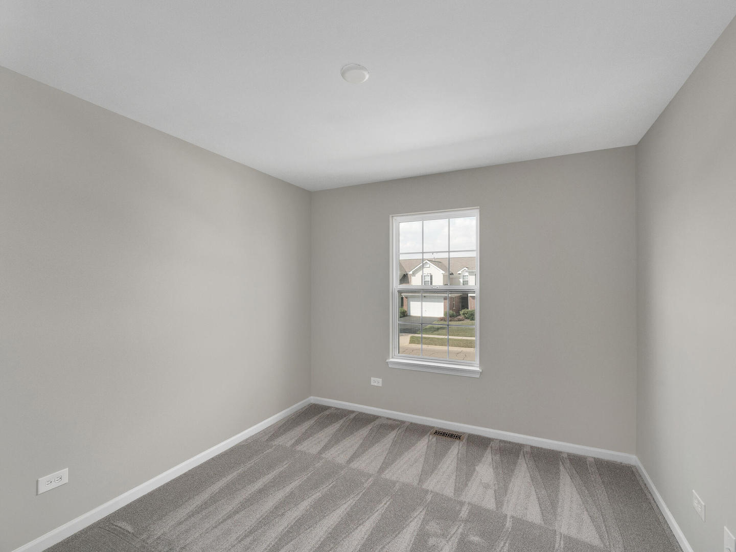 1117 Draper Road McHenry, IL 60050 - Photo 15 of 26 an empty room with windows