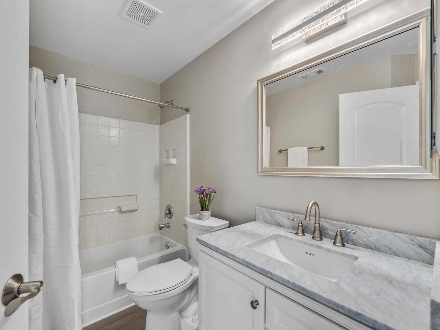 1117 Draper Road McHenry, IL 60050 - Photo 17 of 26 a bathroom with a granite countertop sink toilet and shower