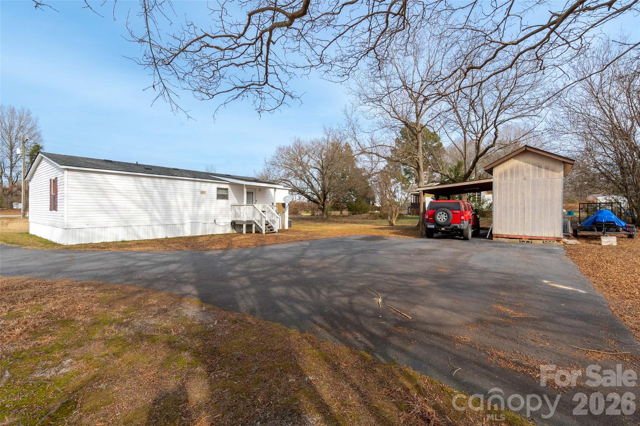 2748 Flat Creek Road Lancaster, SC 29720 - Photo 20 of 24 a view of street with parked cars