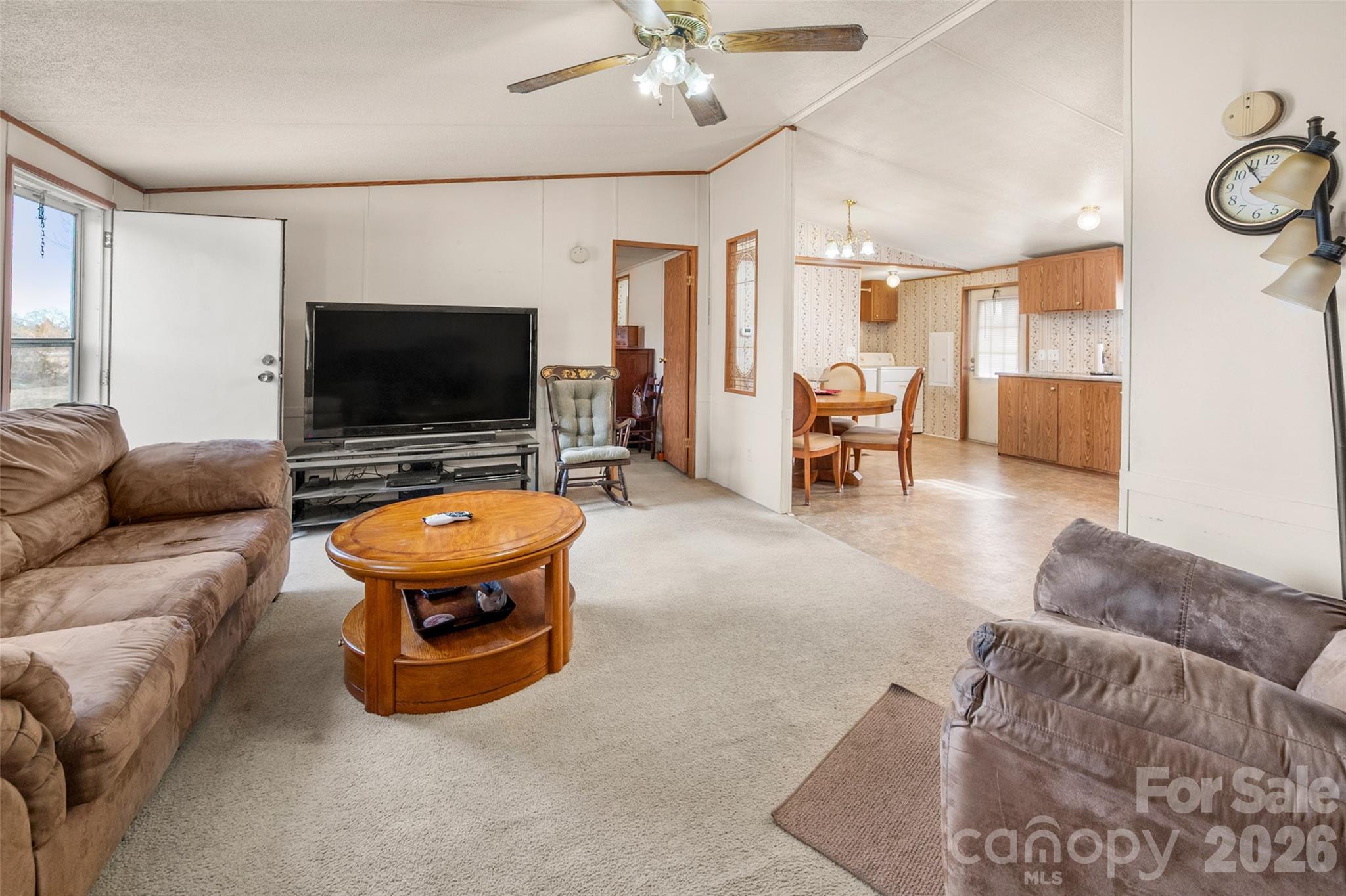2748 Flat Creek Road Lancaster, SC 29720 - Photo 3 of 24 a living room with furniture and a flat screen tv