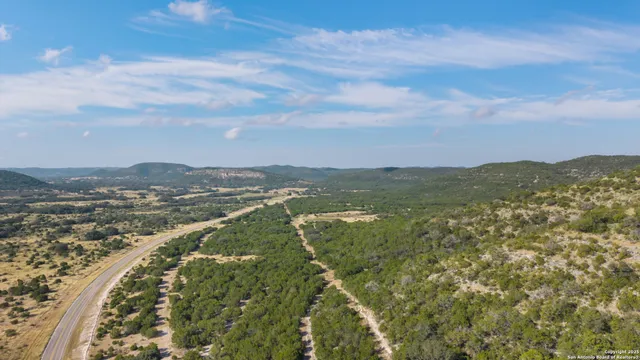 a view of a city with mountains in the background