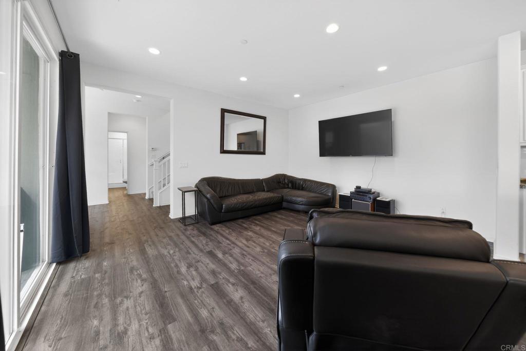 21641 Trail Ridge Drive Escondido, CA 92029 - Photo 11 of 43 a living room with furniture and a flat screen tv