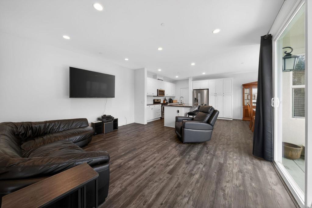 21641 Trail Ridge Drive Escondido, CA 92029 - Photo 12 of 43 a living room with furniture and a flat screen tv