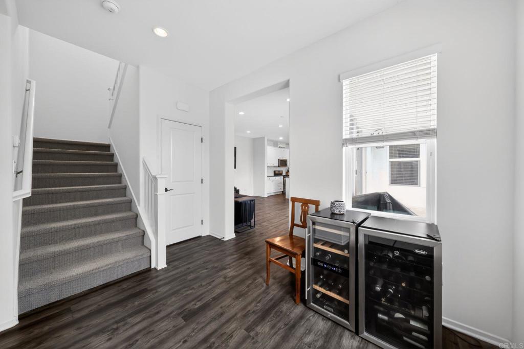 21641 Trail Ridge Drive Escondido, CA 92029 - Photo 13 of 43 a view of bedroom with furniture and wooden floor
