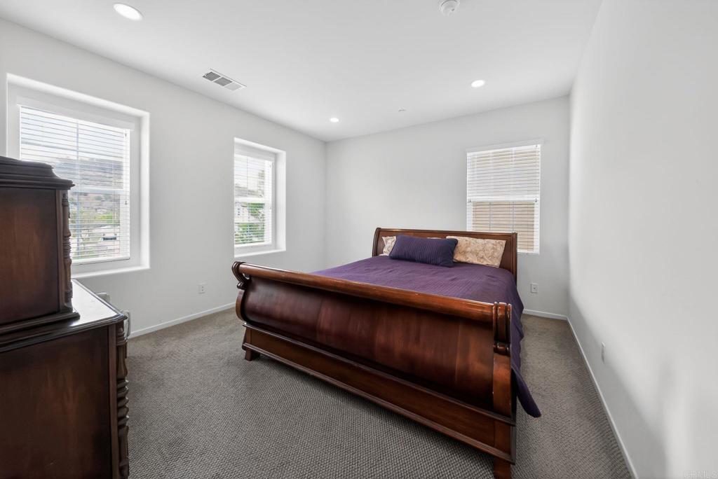 21641 Trail Ridge Drive Escondido, CA 92029 - Photo 18 of 43 a bed sitting in a room next to a window