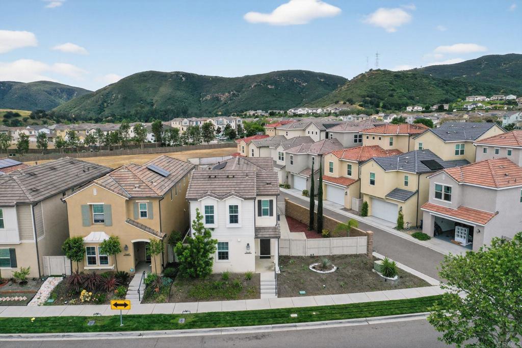 21641 Trail Ridge Drive Escondido, CA 92029 - Photo 2 of 43 a aerial view of multiple houses with a city view