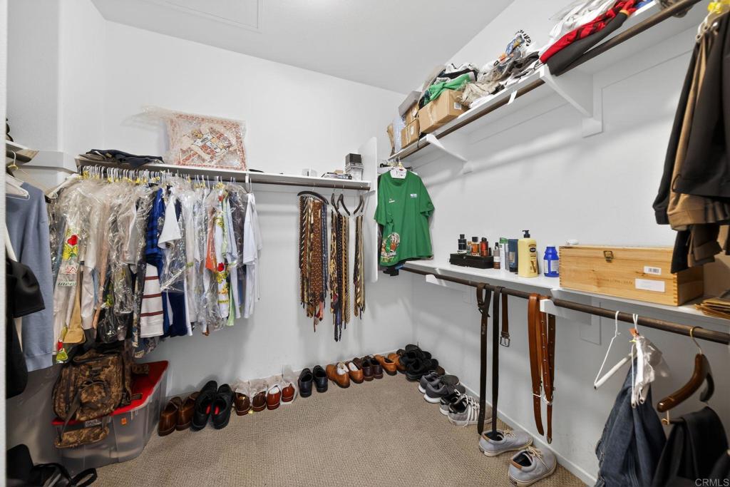 21641 Trail Ridge Drive Escondido, CA 92029 - Photo 21 of 43 a view of walk in closet with clothes and shoes