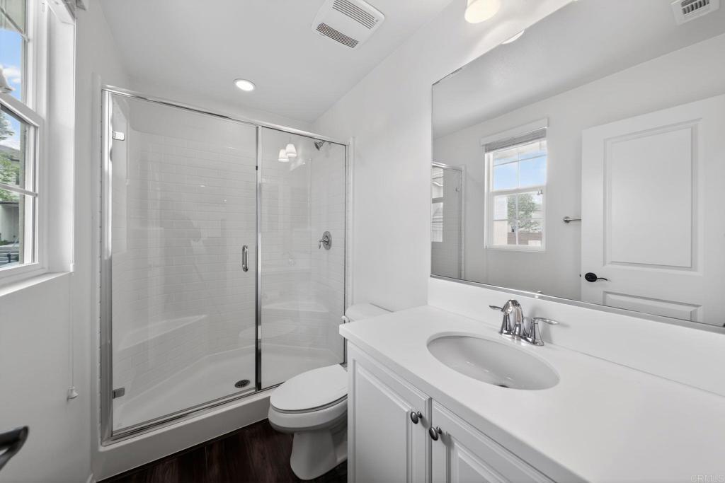 21641 Trail Ridge Drive Escondido, CA 92029 - Photo 25 of 43 a bathroom with a sink toilet and shower
