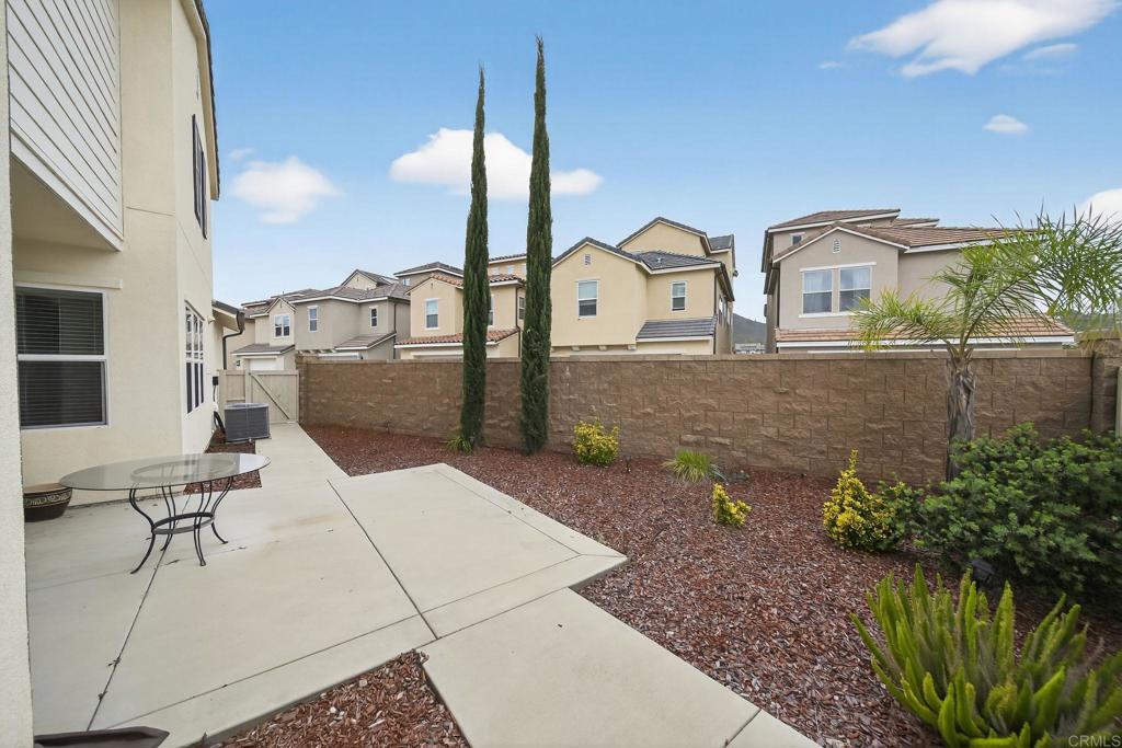 21641 Trail Ridge Drive Escondido, CA 92029 - Photo 27 of 43 a front view of a house with garden