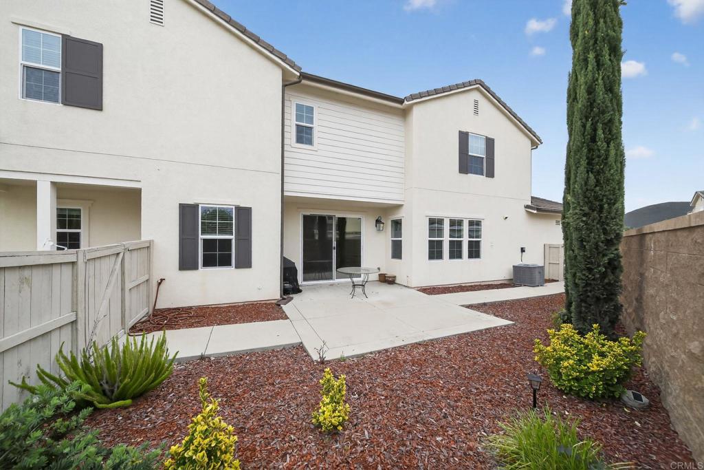21641 Trail Ridge Drive Escondido, CA 92029 - Photo 29 of 43 a front view of a house with garden
