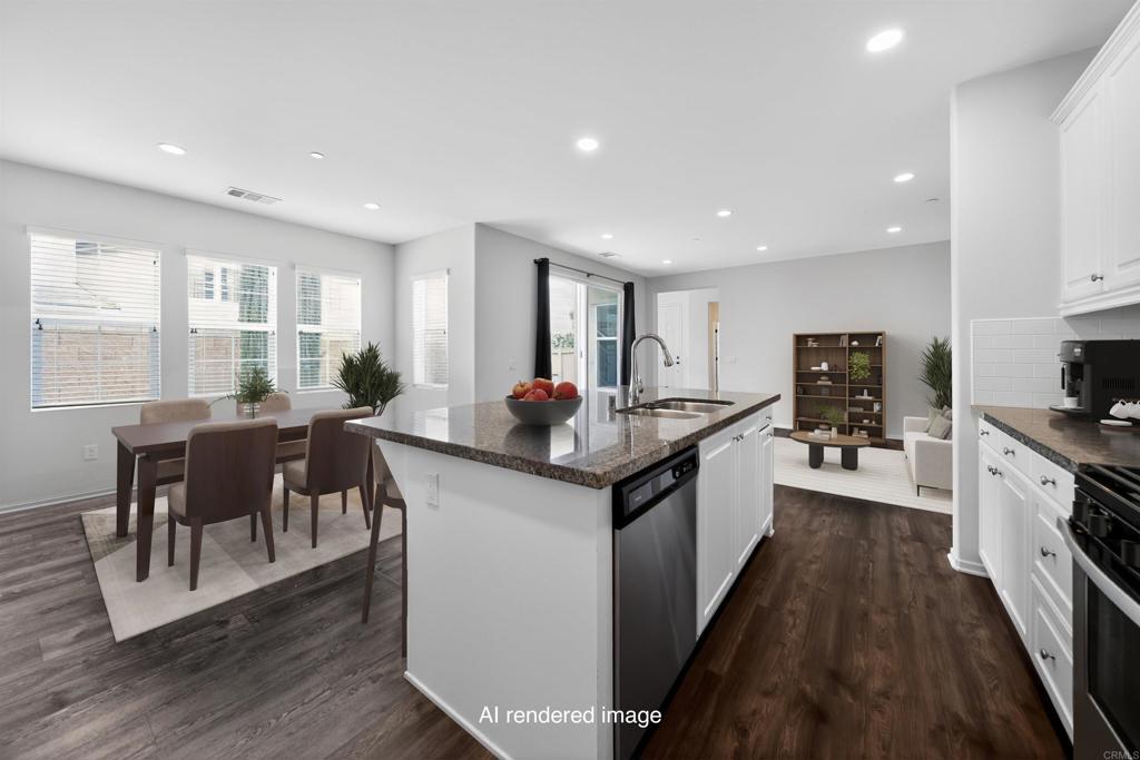 21641 Trail Ridge Drive Escondido, CA 92029 - Photo 3 of 43 a kitchen with granite countertop lots of counter top space and stainless steel appliances