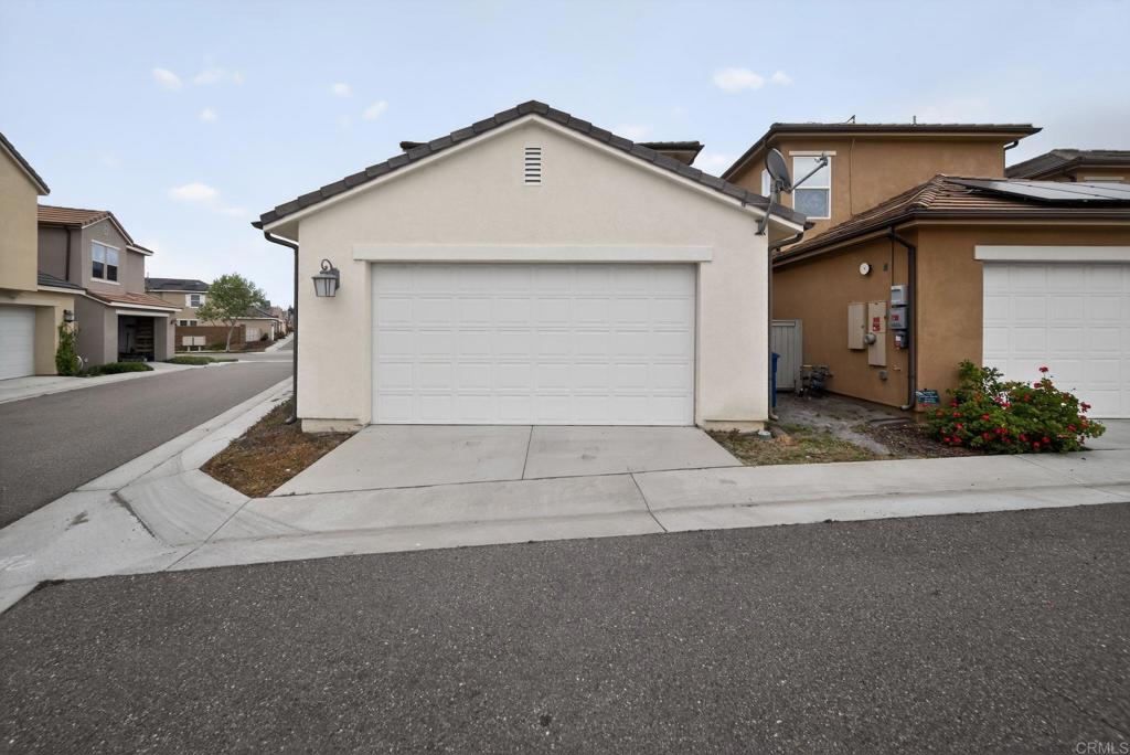 21641 Trail Ridge Drive Escondido, CA 92029 - Photo 32 of 43 front view of a house with a street