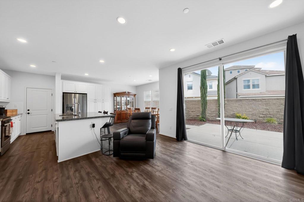 21641 Trail Ridge Drive Escondido, CA 92029 - Photo 9 of 43 a living room with furniture and a wooden floor