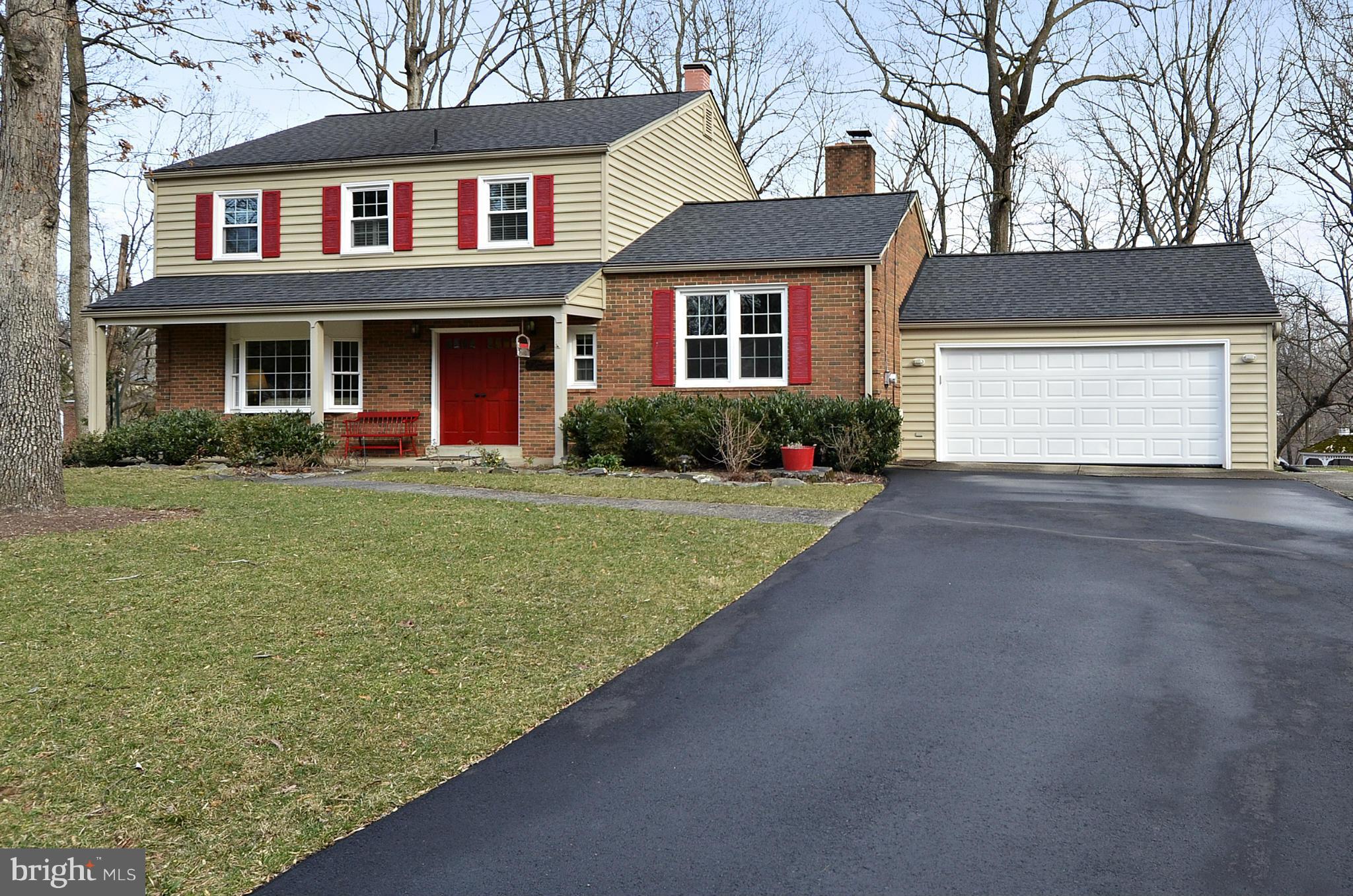 11709 Auth Lane Silver Spring, MD 20902 - Photo 3 of 30 Front Driveway 2-Car Garage