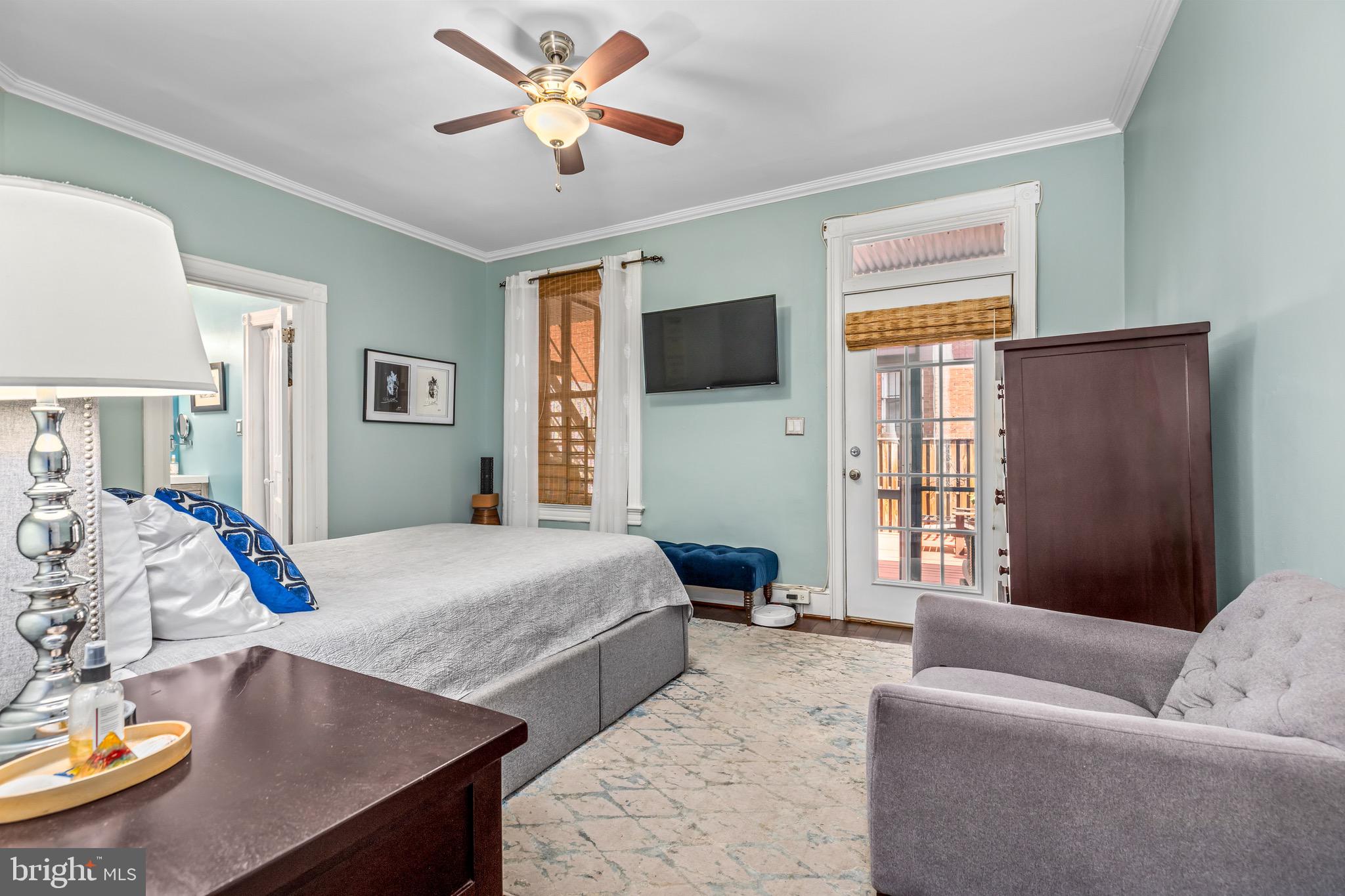 502 G Street Northeast Washington, DC 20002 - Photo 16 of 39 a living room with furniture and a flat screen tv