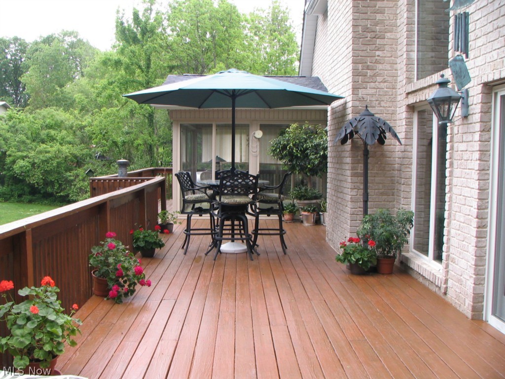 3518 Scheid Road Huron, OH 44839 - Photo 16 of 25 Gorgeous deck off the kitchen with additional access from the sunroom off the master bedroom.