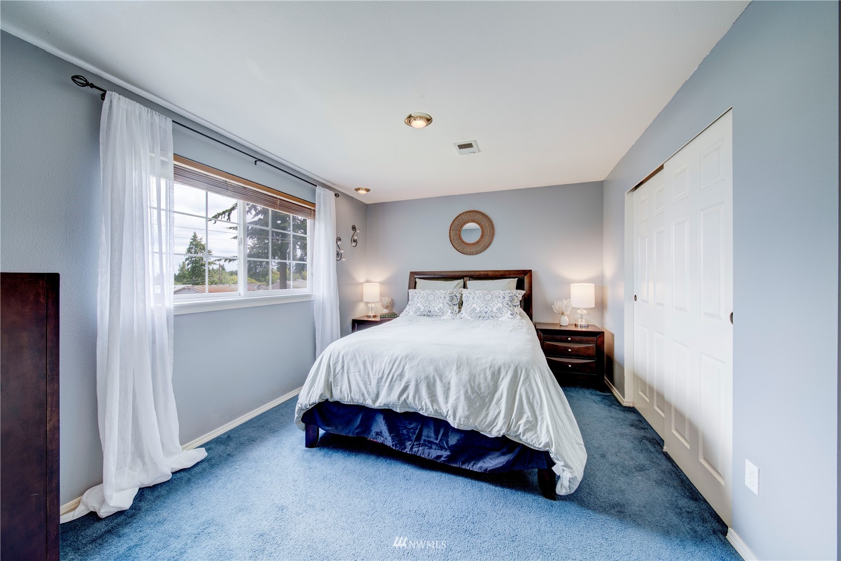 6018 Lowell Road Everett, WA 98203 - Photo 14 of 21 a bedroom with a bed and window