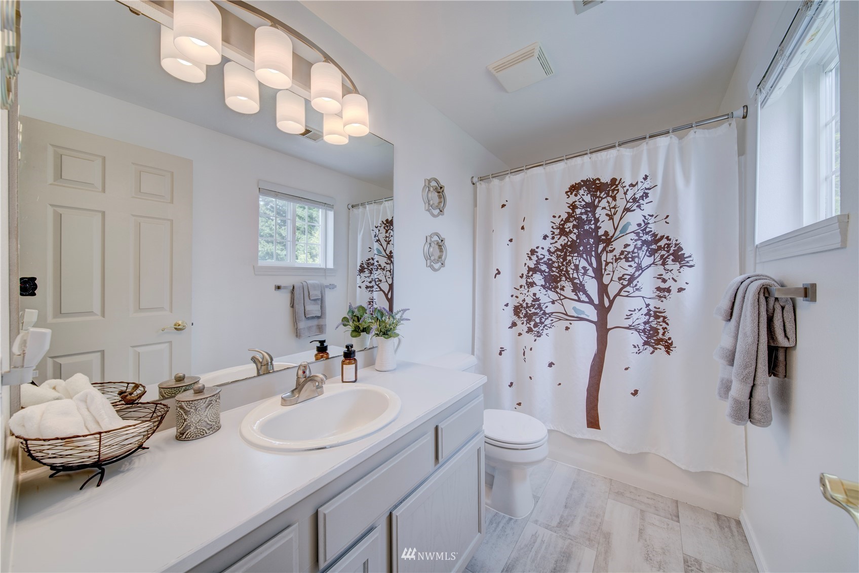 6018 Lowell Road Everett, WA 98203 - Photo 15 of 21 a bathroom with a sink toilet and shower