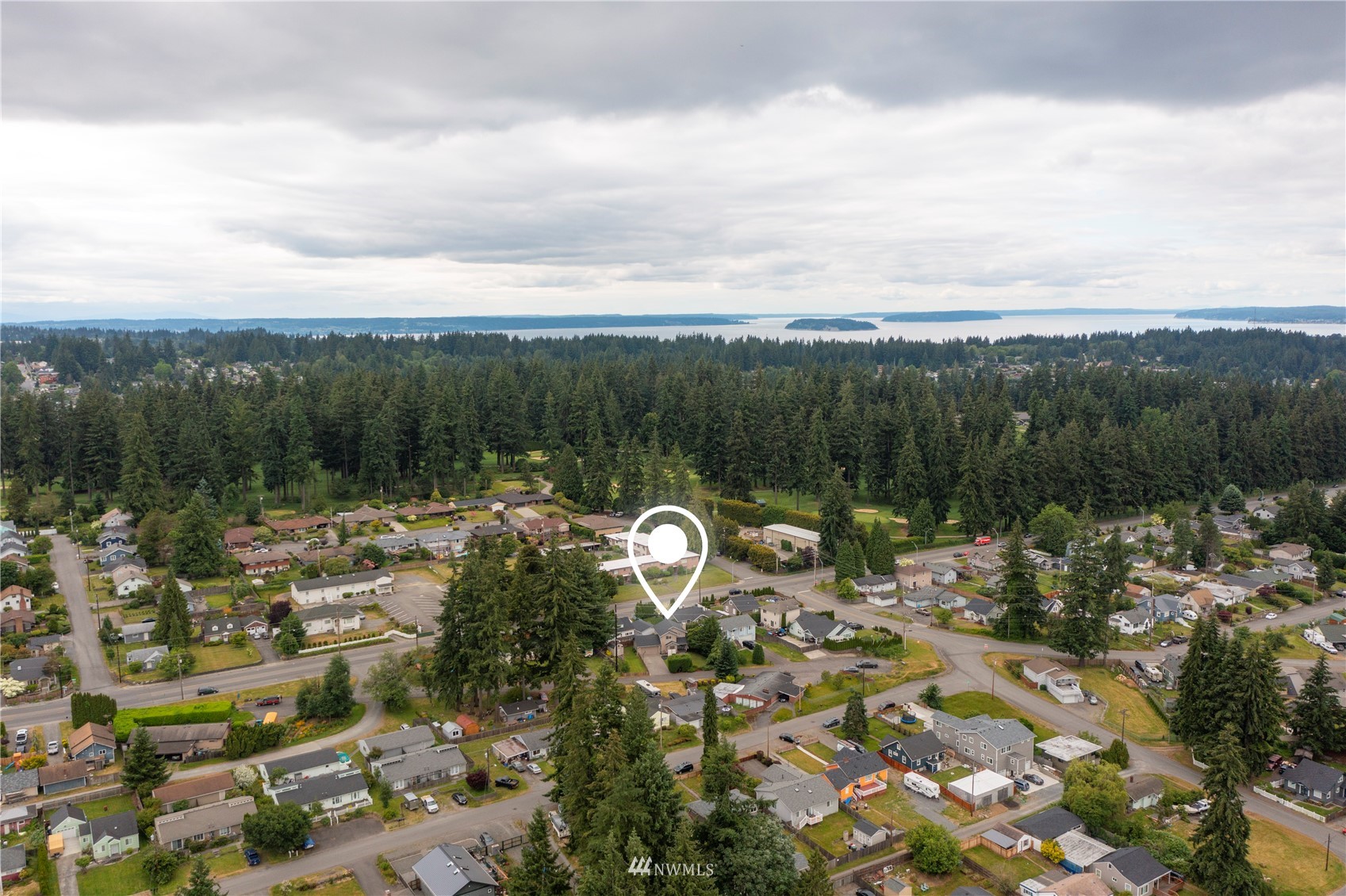 6018 Lowell Road Everett, WA 98203 - Photo 20 of 21 a view of a lake with top of house