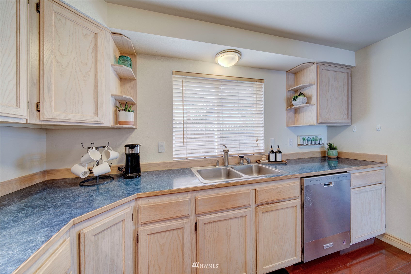 6018 Lowell Road Everett, WA 98203 - Photo 10 of 21 a kitchen with sink and cabinets