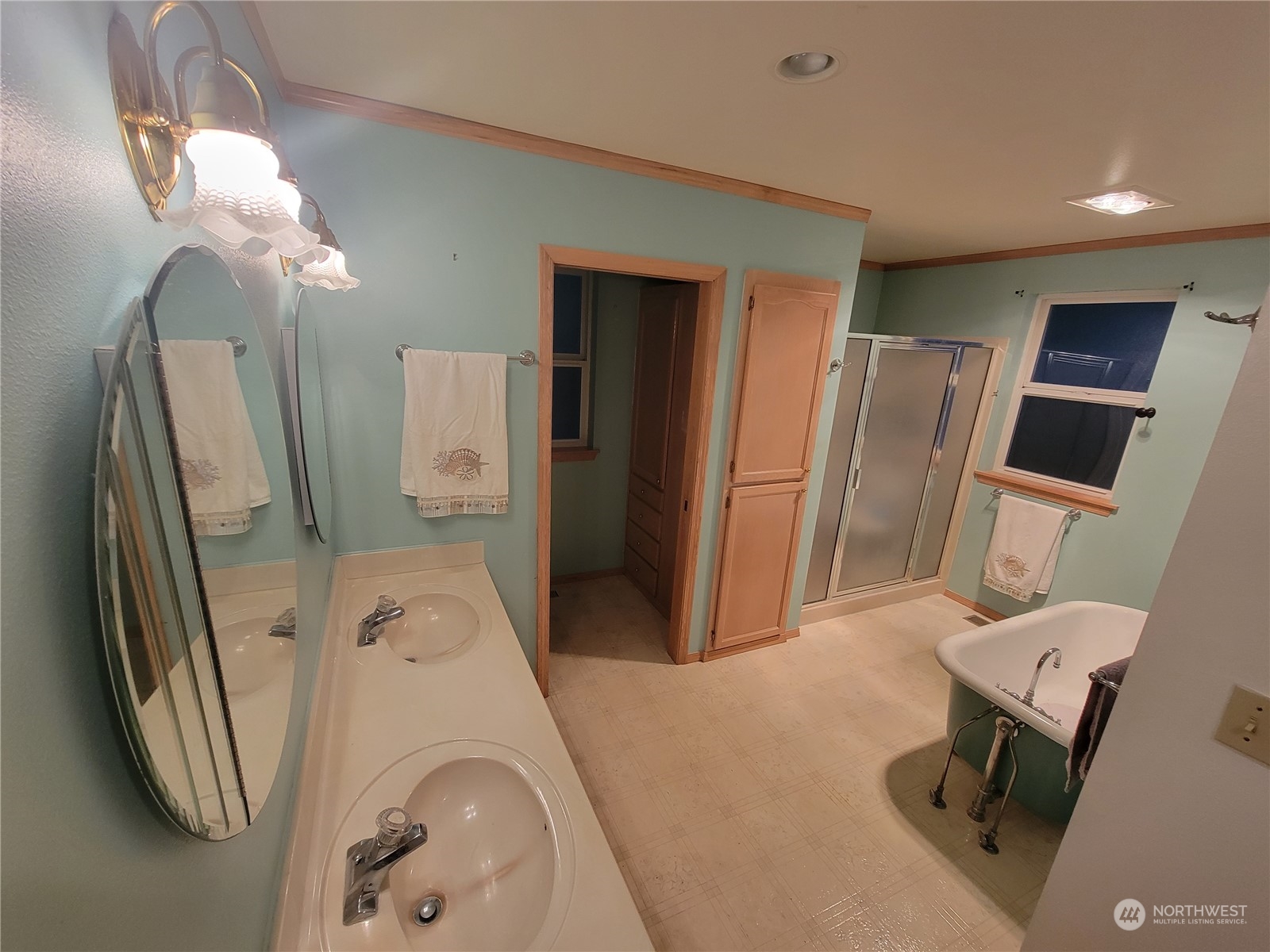 19618 Jordan Road Arlington, WA 98223 - Photo 15 of 32 a bathroom with a sink and a mirror