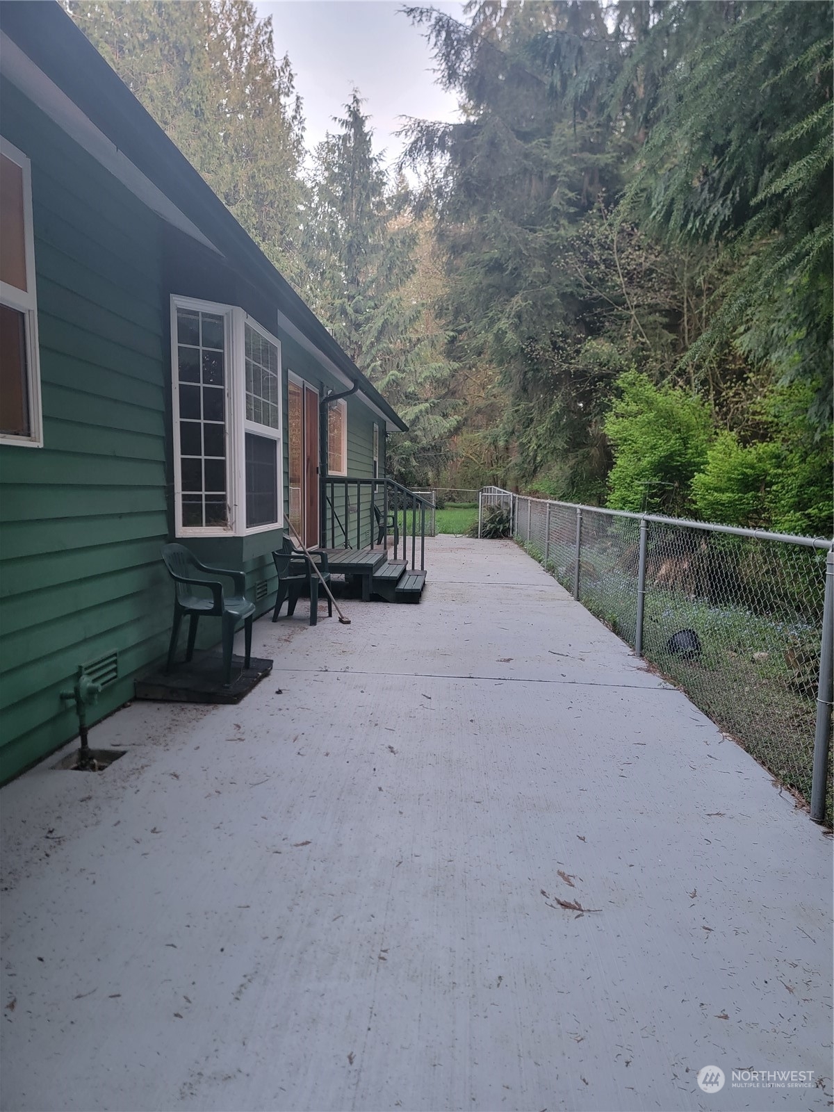 19618 Jordan Road Arlington, WA 98223 - Photo 28 of 32 a view of a house with a yard