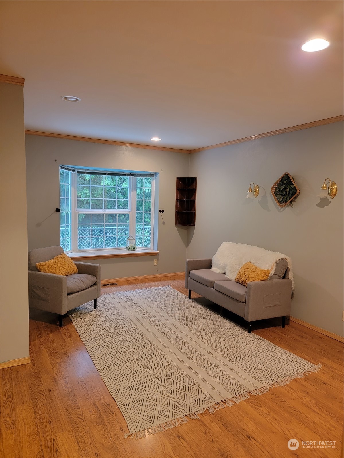 19618 Jordan Road Arlington, WA 98223 - Photo 30 of 32 a bedroom with furniture and a large window