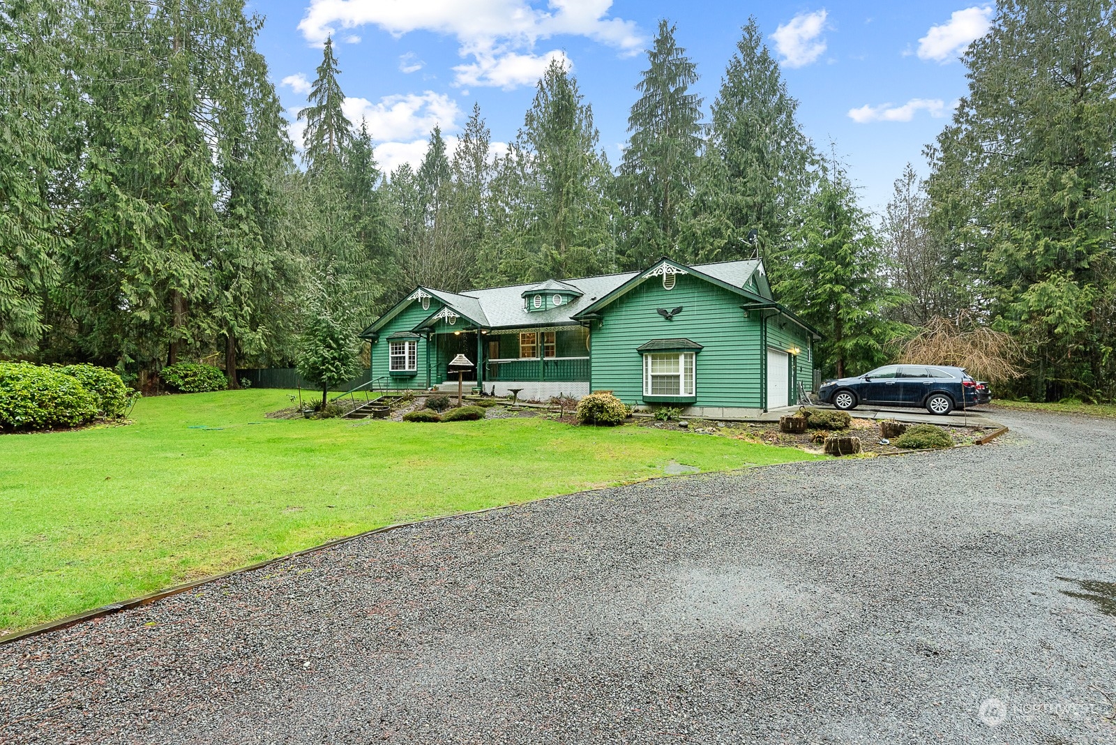 19618 Jordan Road Arlington, WA 98223 - Photo 3 of 32 a house view with a garden space