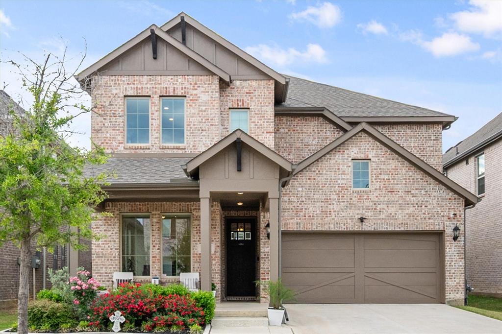 208 Scottish Way Mansfield, TX 76063 - Photo 1 of 1 a front view of a house with a yard and garage