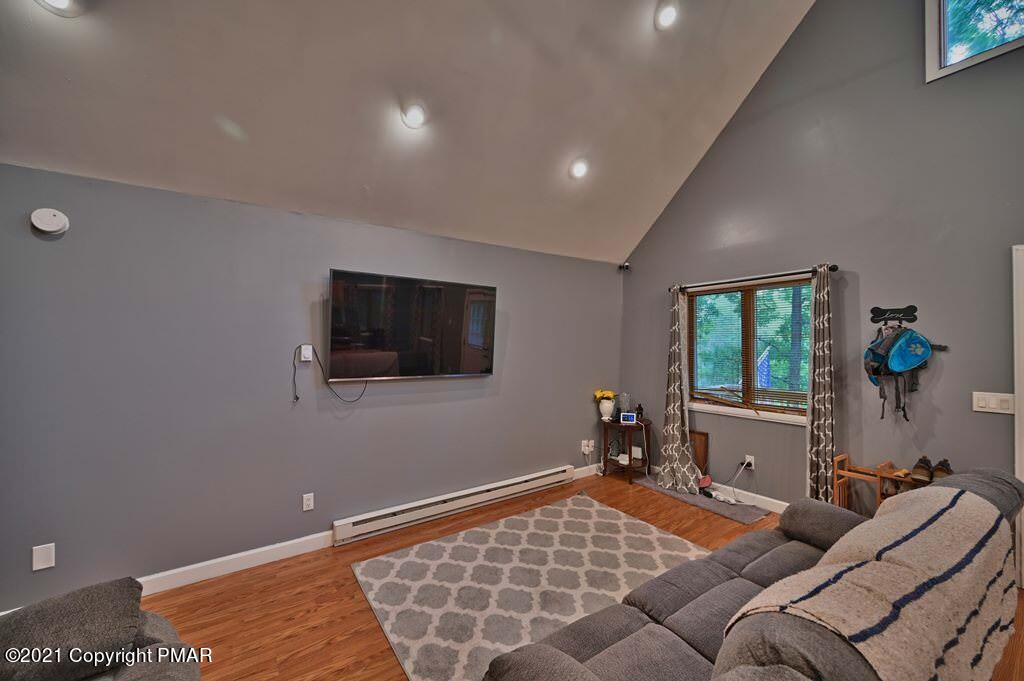 152 Canterbury Road Bushkill, PA 18324 - Photo 18 of 57 a bed room with a bed and a window