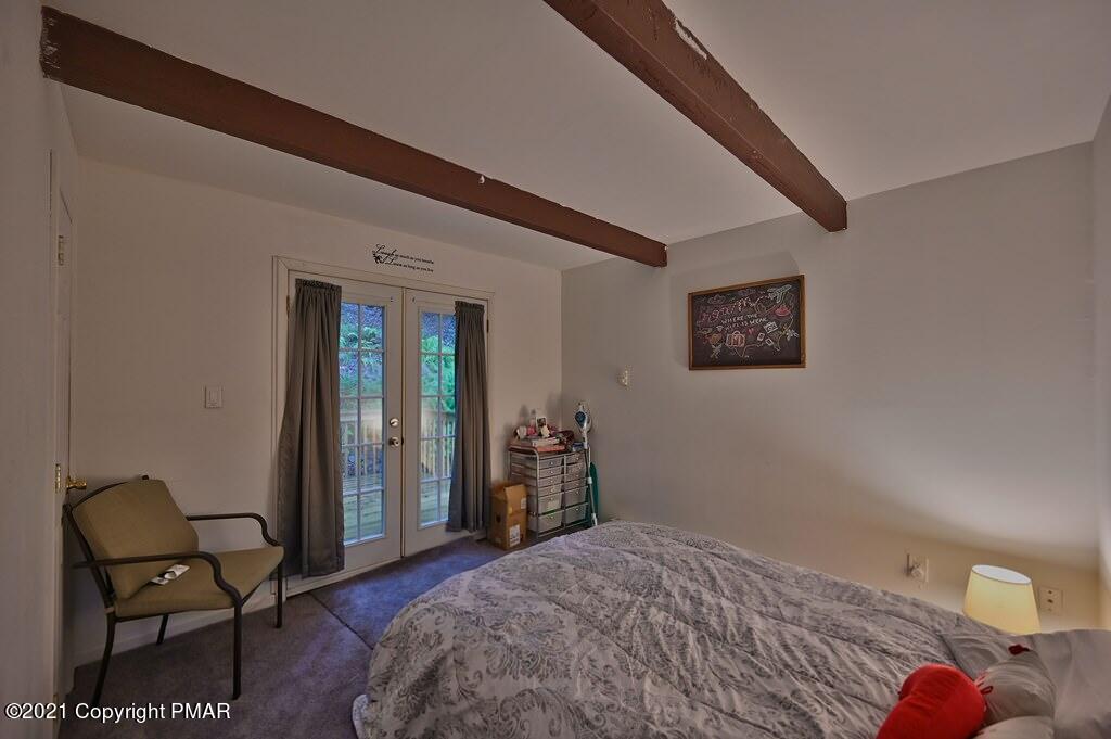 152 Canterbury Road Bushkill, PA 18324 - Photo 19 of 57 a bedroom with a bed and furniture