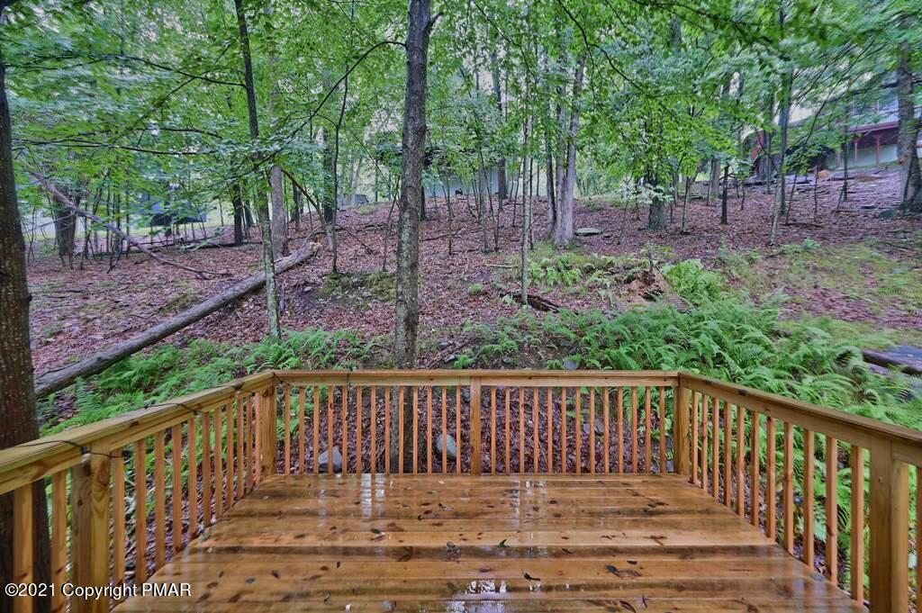 152 Canterbury Road Bushkill, PA 18324 - Photo 23 of 57 a view of deck and backyard with trees