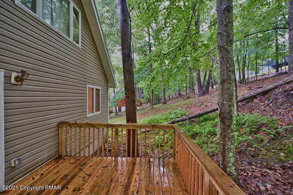 152 Canterbury Road Bushkill, PA 18324 - Photo 25 of 57 a view of balcony with wooden floor and fence
