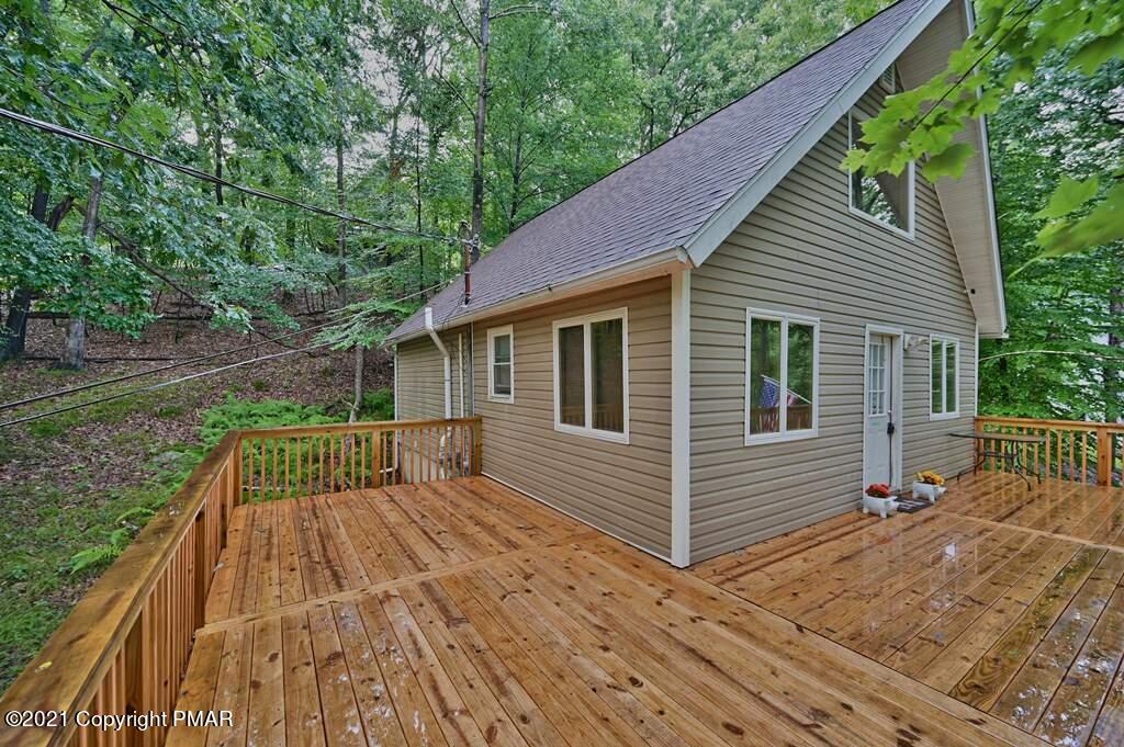 152 Canterbury Road Bushkill, PA 18324 - Photo 4 of 57 a view of backyard with a deck
