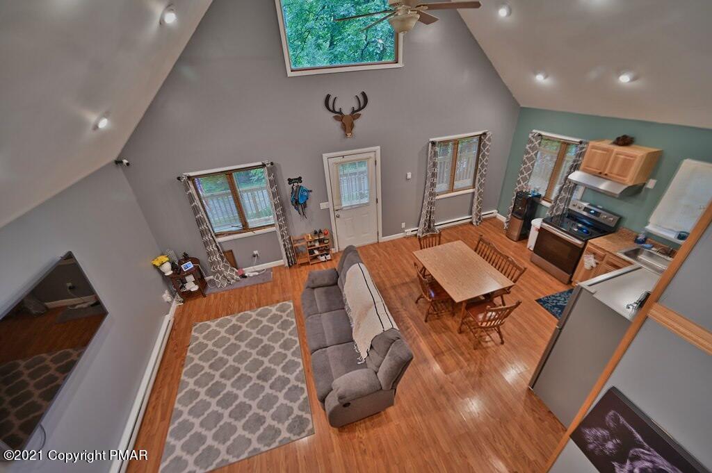 152 Canterbury Road Bushkill, PA 18324 - Photo 49 of 57 a living room with furniture and wooden floor