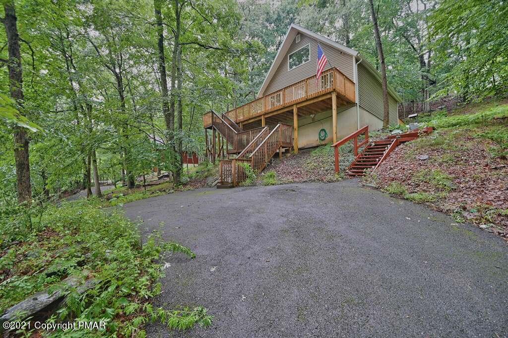 152 Canterbury Road Bushkill, PA 18324 - Photo 52 of 57 a view of a house with a yard