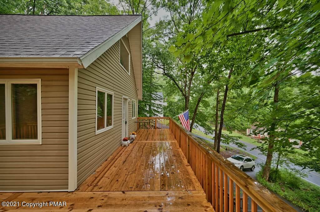 152 Canterbury Road Bushkill, PA 18324 - Photo 55 of 57 a view of balcony with wooden floor and fence