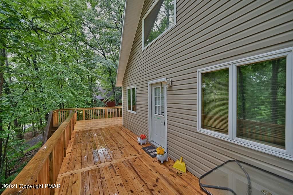 152 Canterbury Road Bushkill, PA 18324 - Photo 56 of 57 a view of a house with backyard and wooden floor