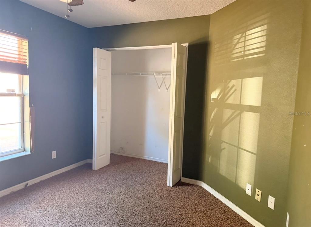 1221 Poe Street Inverness, FL 34450 - Photo 2 of 11 a view of an empty room with a window