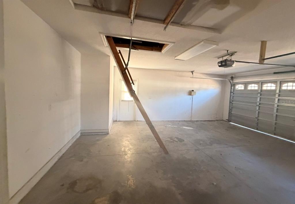 1221 Poe Street Inverness, FL 34450 - Photo 7 of 11 a view of a garage