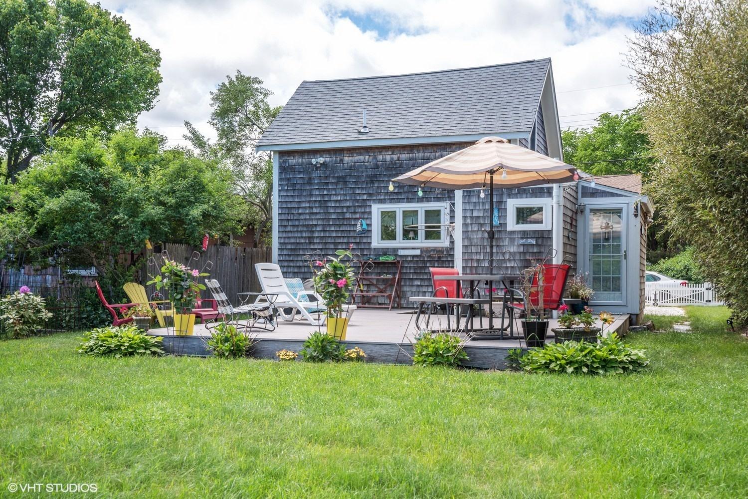 17 Wareham Avenue Onset, MA 02558 - Photo 12 of 15 a view of a house with a backyard and sitting area