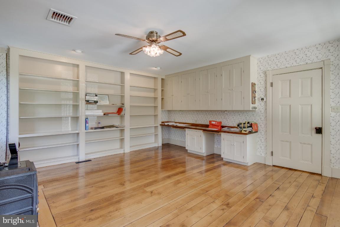 1201 Gold Mine Road Brookeville, MD 20833 - Photo 20 of 61 Living room with built in shelving