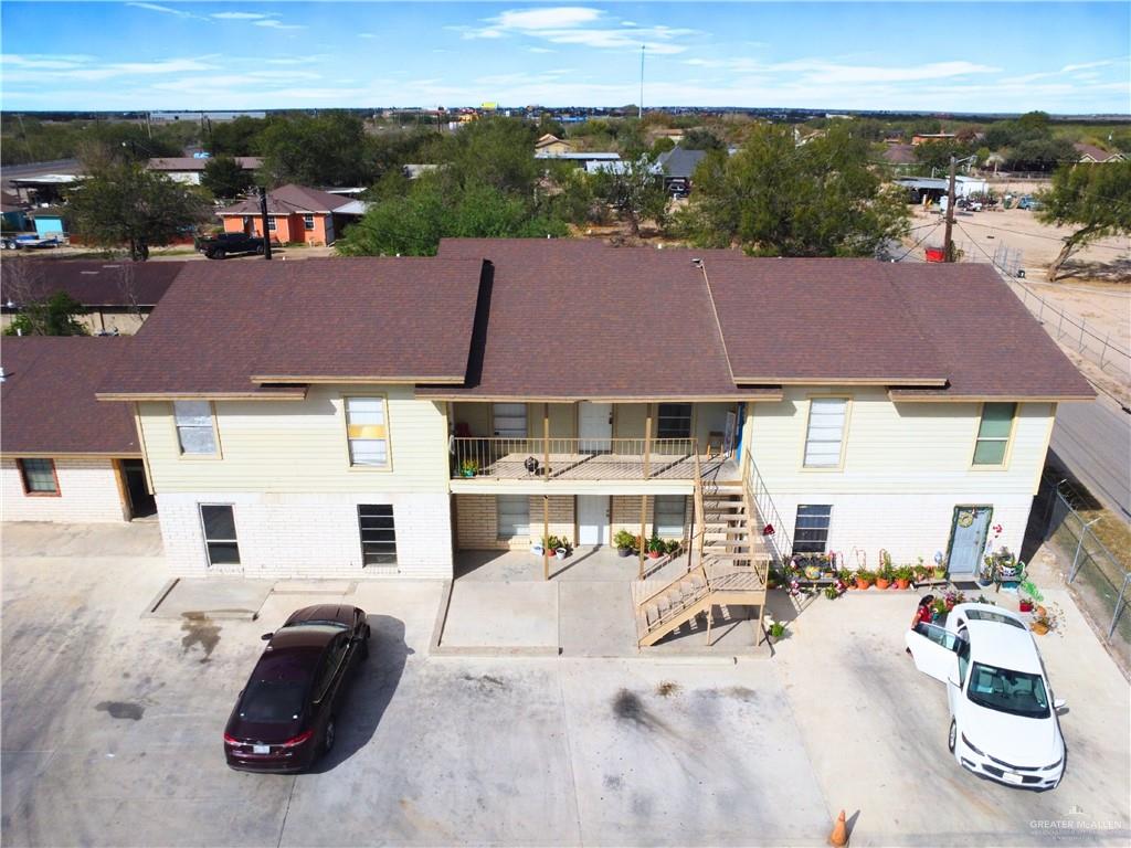 5007 East US Highway 83 Rio Grande City, TX 78582 - Photo 13 of 26 an aerial view of a house with a garden and lake view