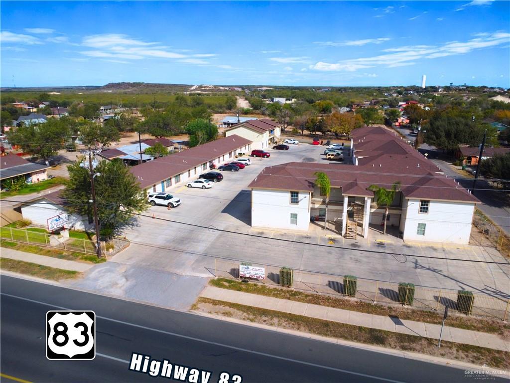 5007 East US Highway 83 Rio Grande City, TX 78582 - Photo 2 of 26 an aerial view of residential houses with outdoor space