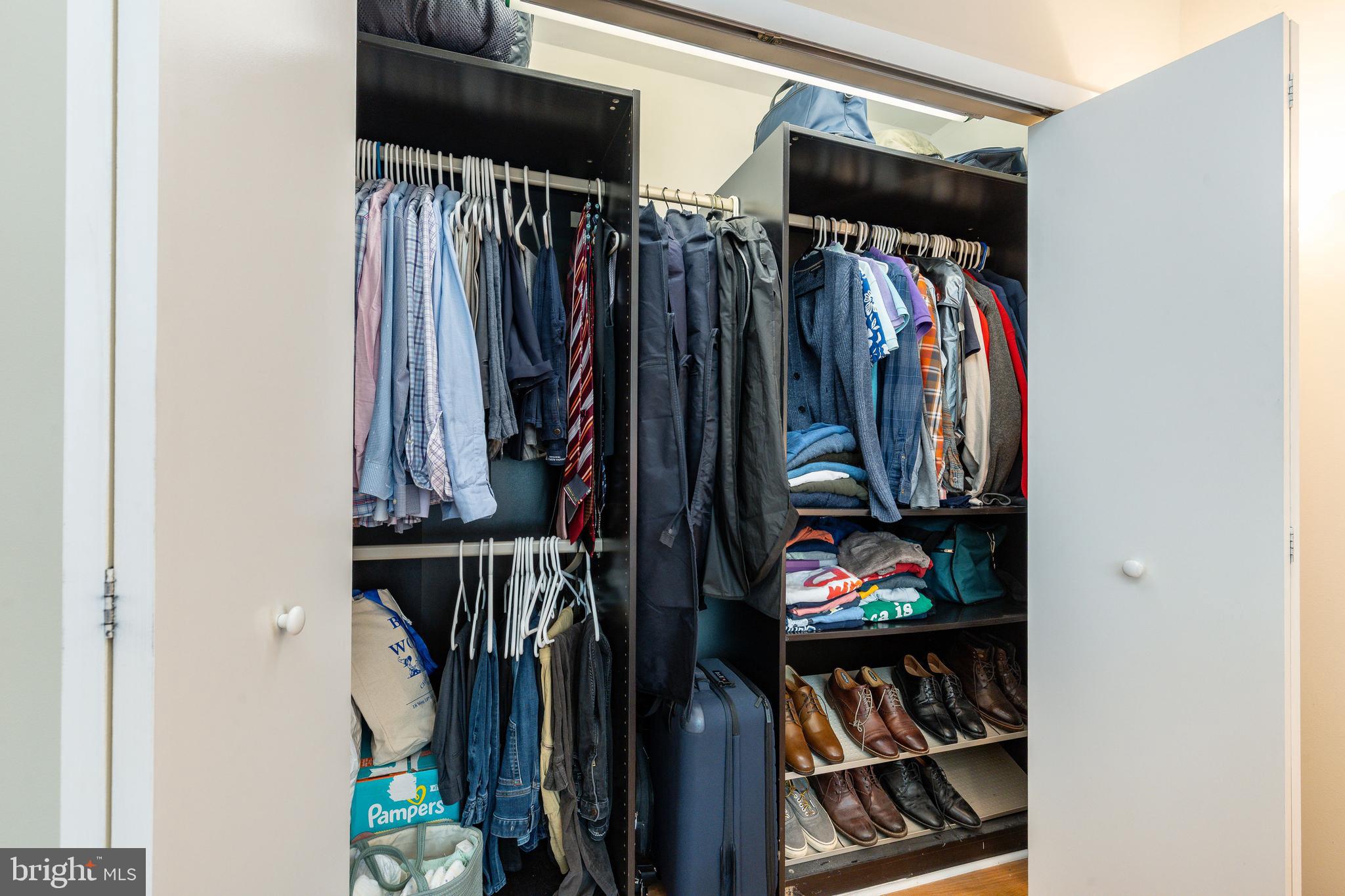 1900 Hamilton Street, Unit C6 Philadelphia, PA 19130 - Photo 23 of 37 a view of walk in closet with clothes and shoes