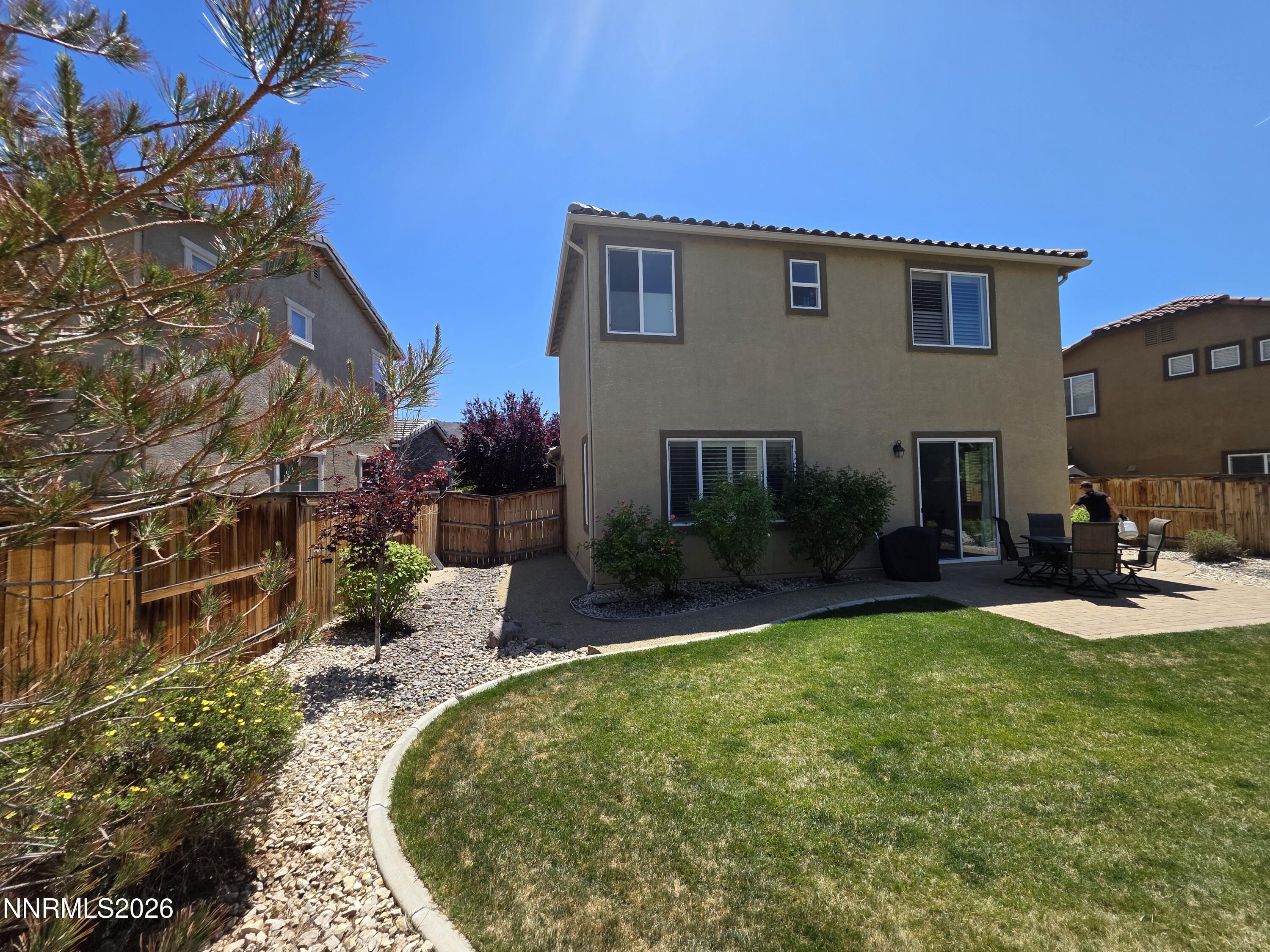 2775 Bonfire Lane Reno, NV 89521 - Photo 3 of 41 a view of a house with backyard porch and sitting area
