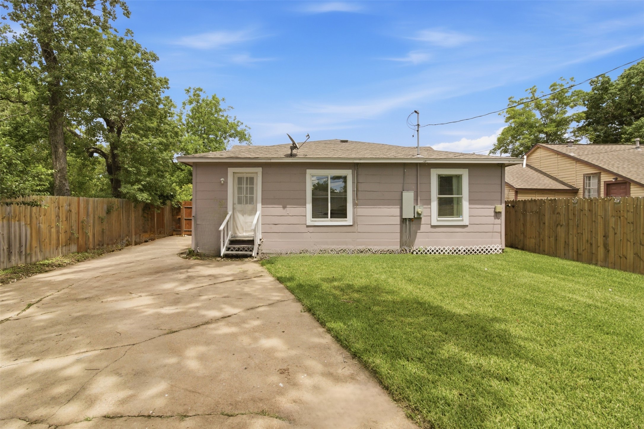 306 Center Street Pasadena, TX 77506 - Photo 26 of 31 a view of a backyard with a garden