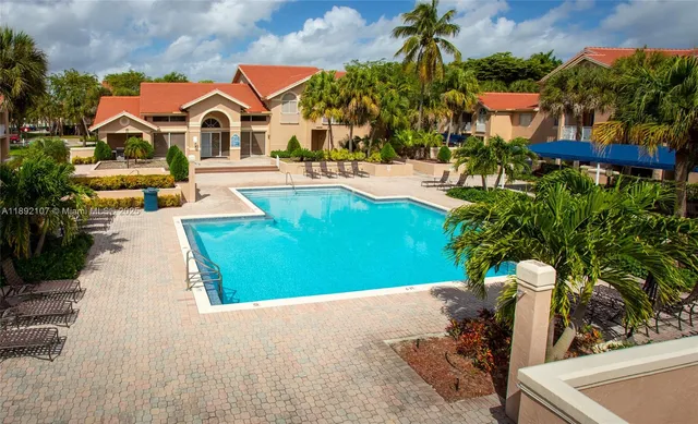 a view of outdoor space with swimming pool