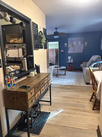 a view of a workspace with furniture